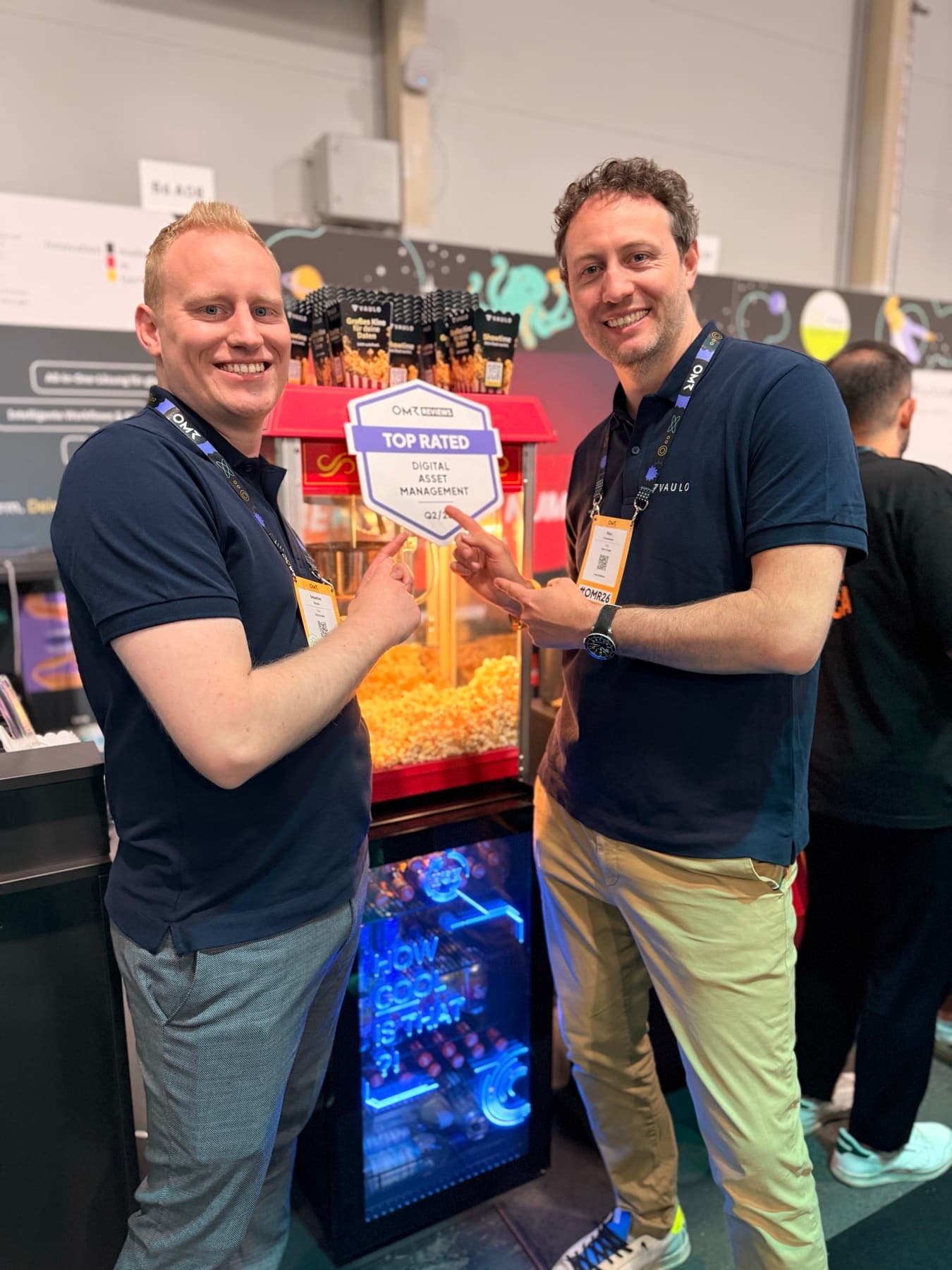 The VAULO founders at their OMR exhibition stand in Hamburg